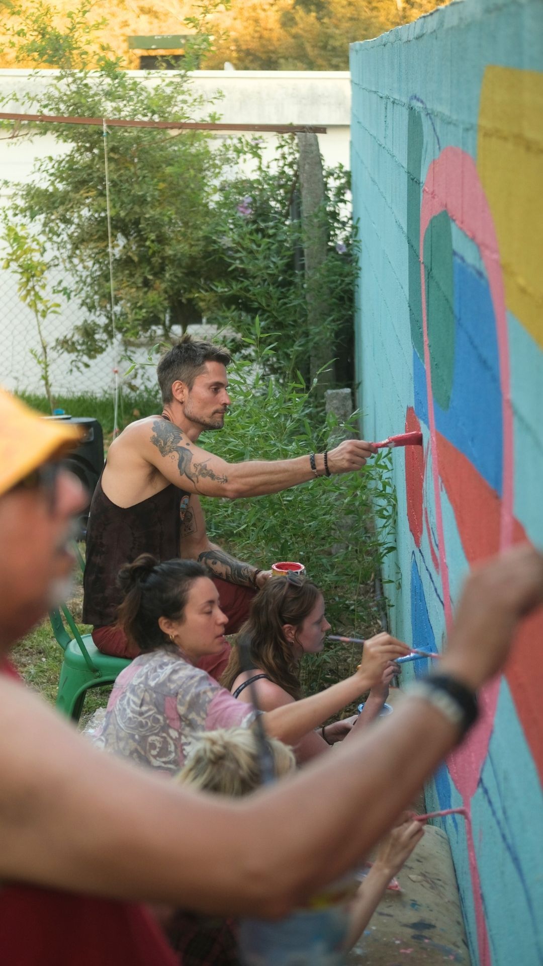 Painting a mural together at StartArt